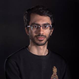 A portrait photo against black background.