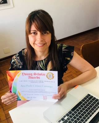 Ana Paula holds her certificare