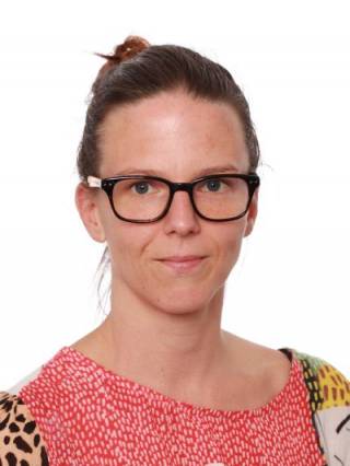 A woman with glasses.