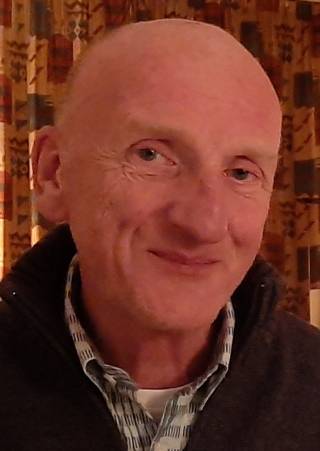 A smiling man.