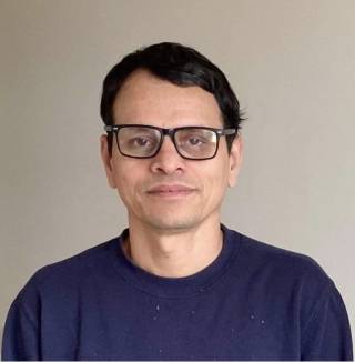 A man with glasses.