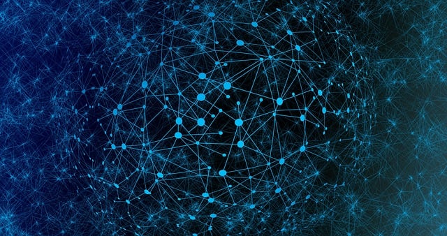 A vast network of light blue nodes and connecting lines against a black background, creating a spherical shape in the center and extending infinitely out in all directions.