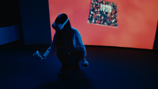 A woman using Oculus Quest 2 VR headset.