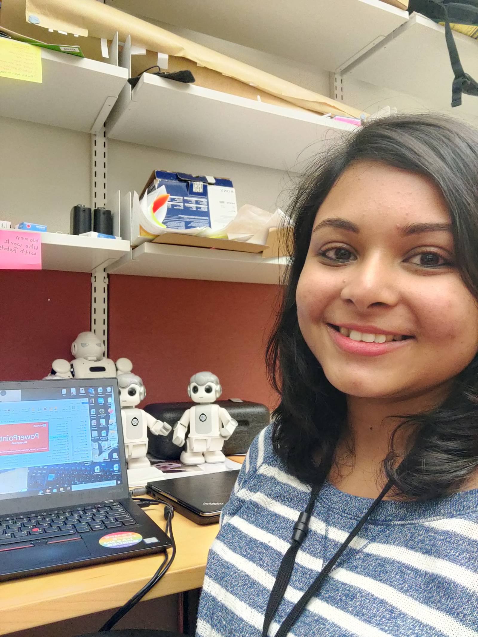 TAU Researcher with a robot