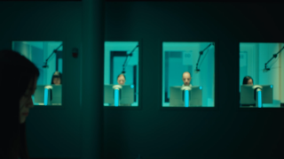 Test subjects playing in test booths.