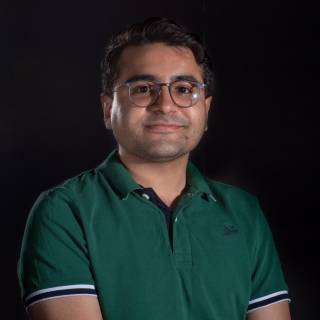A portrait photo against black background.