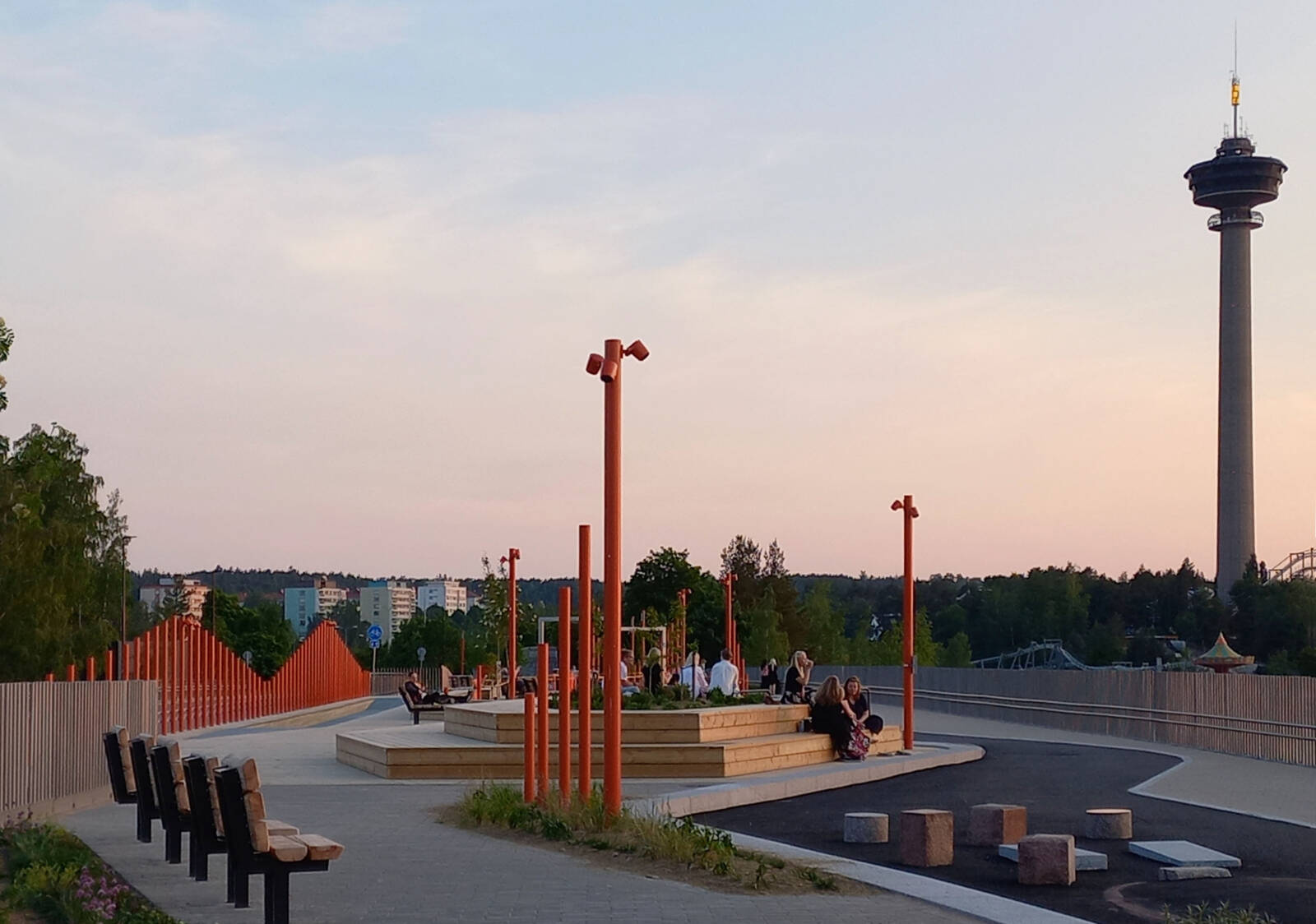 A landscape bridge in Tampere, with a picture of Näsinneula tower in the background.