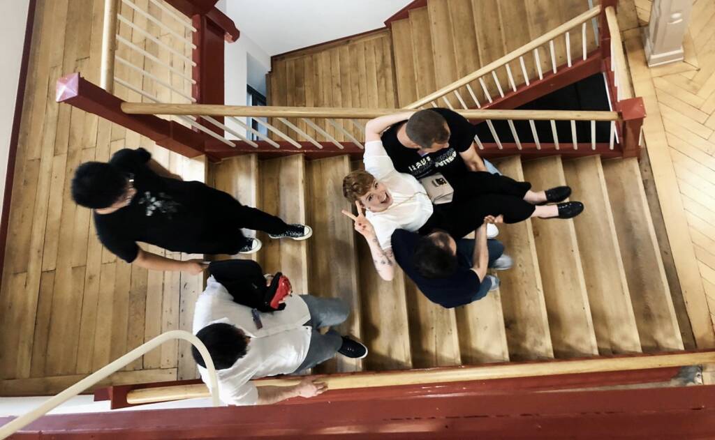 Fellow attendees lending a helping hand as I'm carried down the stairs at the 3R Center Tübingen en route to the hospital. Photo: Ina Carmans 