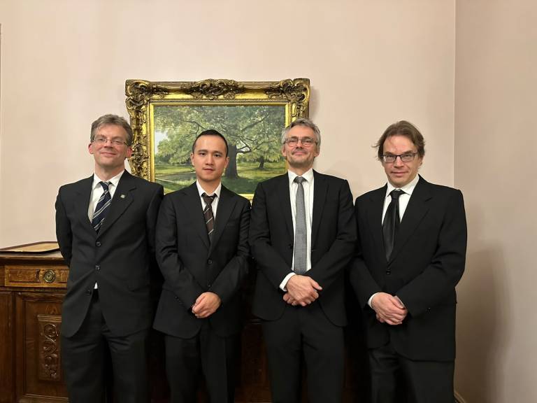 Professor Christian Smith (opponent, KTH Royal Institute of Technology), Wenyan Yang, Professor Joni Kämäräinen (supervisor) and Professor Ville Hautamäki (opponent, Uni Eastern Finland)