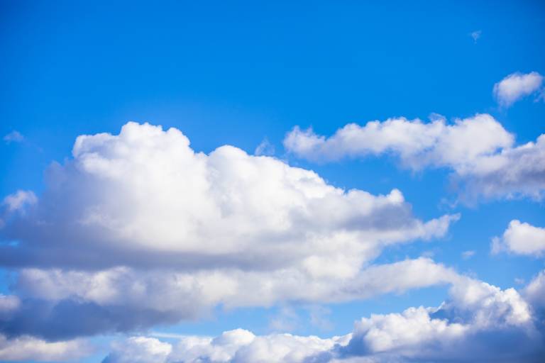 An image of a blue sky with white clouds