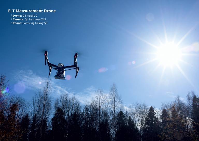 Picture of a drone up in the air with some general details of the equipment.