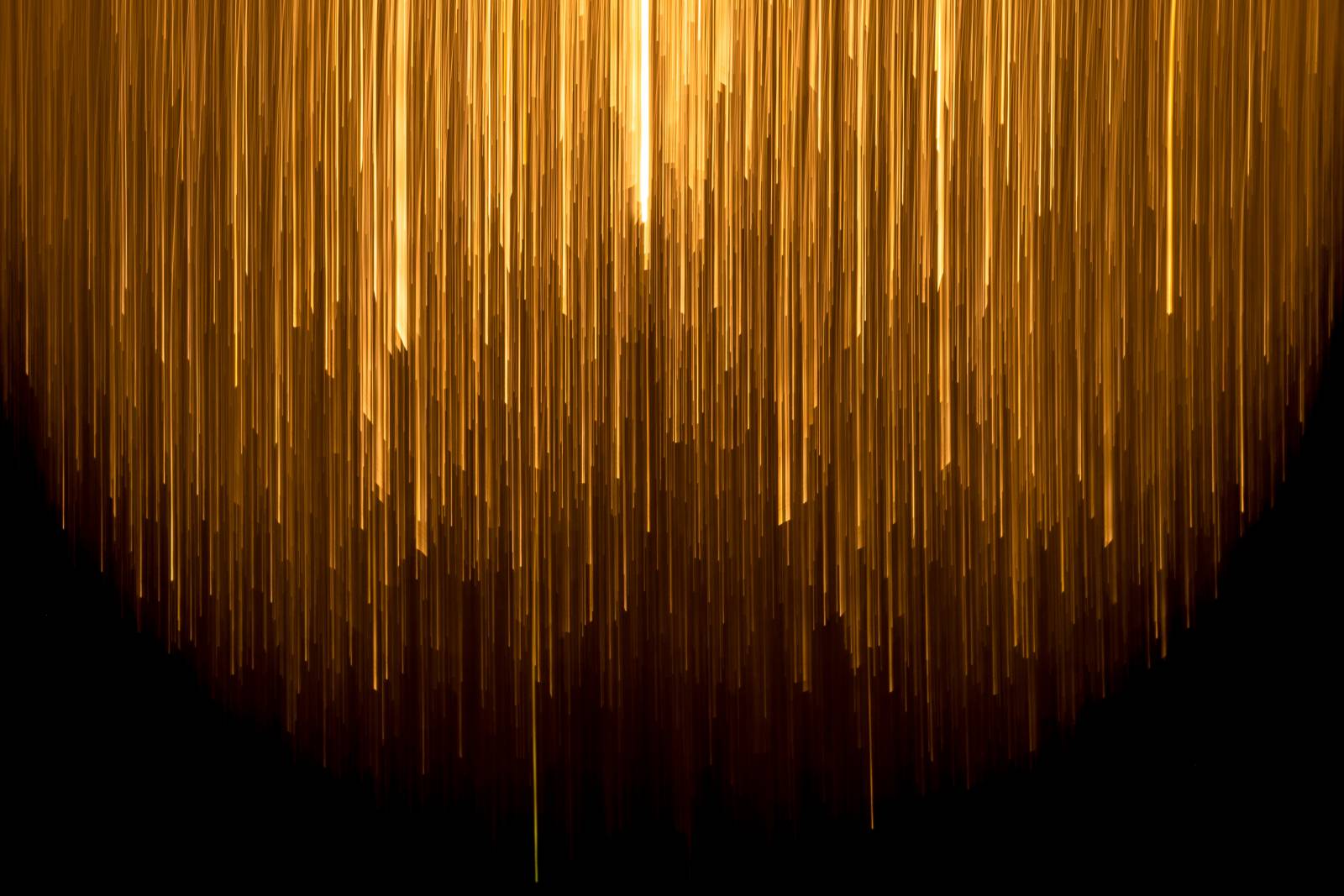 abstract picture with yellow stripes on black background