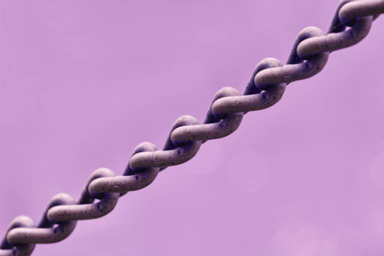 Chain moving across a purple background.