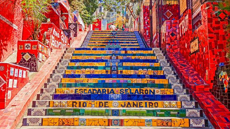 ‘Escadaria Selarón’ is a set of world-famous steps in Rio de Janeiro, Brazil (constructed by the Chilean-born artist Jorge Selarón, 1990-2013). Photo credits: Thales Botelho de Sousa, 2021 on UnSplash.